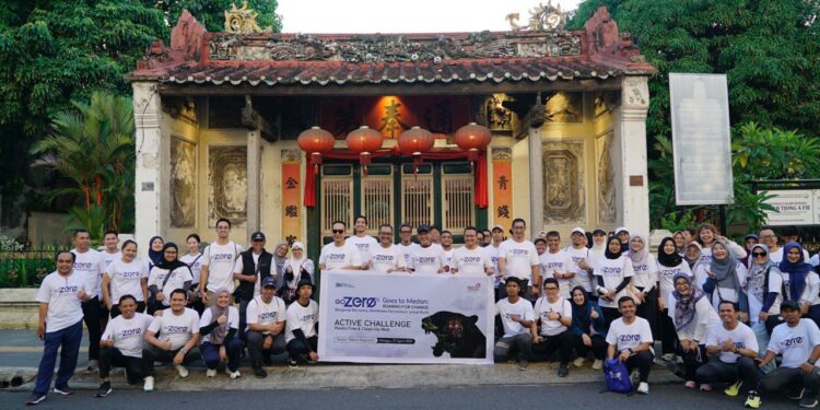 Telkom Gelar Aksi Jalan Santai Sambil Pilah Sampah Plastik dalam Rangkaian GoZero% Goes to Medan